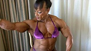 Muscular Women Showing Off Biceps in a Wild Flexing Show at Gym