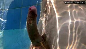 Hardcore blowjob underwater with shaved babe Minnie Manga in wet action.