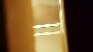 Spying on prostitute shaving her hairy pussy