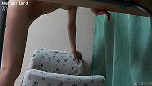 Hina Nanase lounges naked at her desk in a private room, her young body exposed on hidden cam