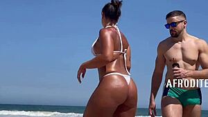 Afrodite Bends Over for Gangbang on Beach