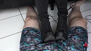 Resting her boots on my cock and balls