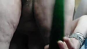 Granny fucks hairy pussy with cucumber in raw action