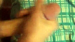 Young British twink masturbates with big cock in bedroom after gay porn viewing