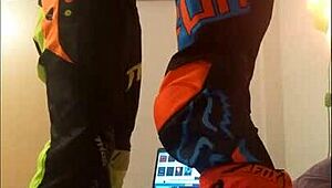 gay motocross rider gives blowjob in costume fetish.
