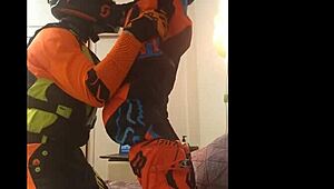 gay motocross rider gives blowjob in costume fetish.