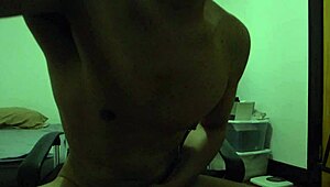 An Asian Hispanic man indulges in solo masturbation