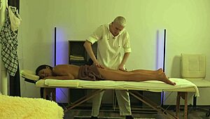 The masseur lured a slutty girlfriend during a session, oiled her up, and drilled her hard on the table
