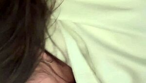 Minxycme moans while sucking dildo.