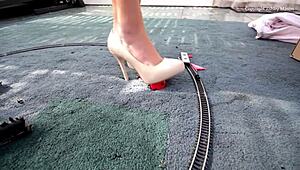 The gay guy picks up his toys after playing.