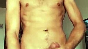 This Hot Soloboy Strokes His Monster Cock Until He Bursts. You Gotta See the Cumshot Action!