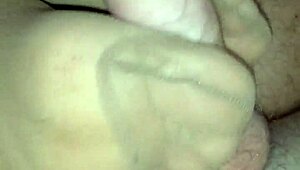 Ugh, givin a homemade footjob with all kinda nylons on!