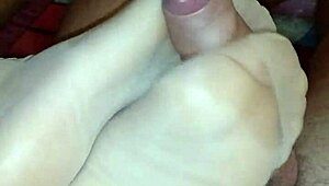 Ugh, givin a homemade footjob with all kinda nylons on!