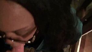 Ebony ball sucking outdoors.