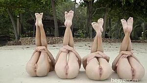 these four stunning girls bare it all on a nude beach.