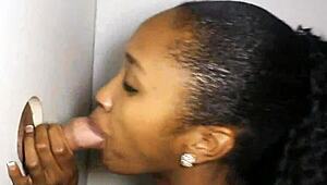 Oh wow, this petite black hottie with small tits and nice ass is blowing strangers at the gloryhole 😏🍆