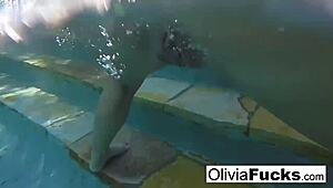 Olivia dominates summer fun with big tits in the pool for wild action!