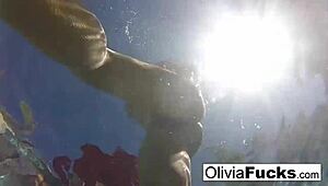 Olivia dominates summer fun with big tits in the pool for wild action!