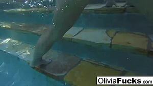 Olivia dominates summer fun with big tits in the pool for wild action!