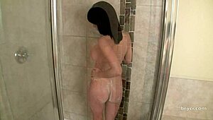 Hot brunette's steamy shower show tempts you