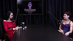 Annie Clementine records a group event with family support in sheer red.