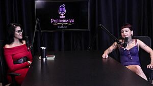 Annie Clementine records a group event with family support in sheer red.