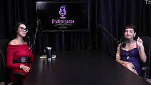 Annie Clementine records a group event with family support in sheer red.