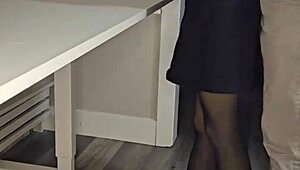 A young poetess reads her poetry with deep emotion in a stunning dress