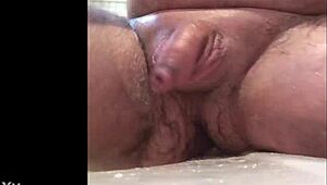 i’m shaving my cock real close, then cumming hard in solo bdsm action!