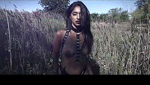 Is this sexy model topless in an outdoor photoshoot teasing you?