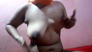 How old is this beautiful woman with huge natural tits?