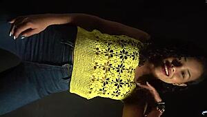 Moving her butt and hips to the music in a sexy outfit with long nails