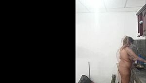 Cute and sexy Latina woman cooks naked showing off her big tall submissive body