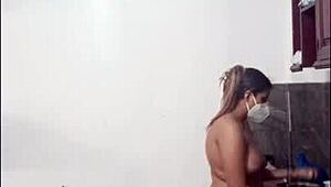 Cute and sexy Latina woman cooks naked showing off her big tall submissive body