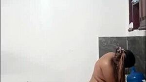 Cute and sexy Latina woman cooks naked showing off her big tall submissive body