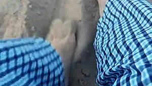 Barefoot Beauty Teases in Natural Sand Setting