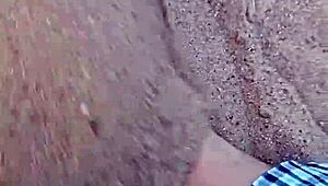 Barefoot Beauty Teases in Natural Sand Setting