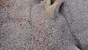 Barefoot Beauty Teases in Natural Sand Setting