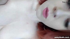 Amateur Redhead Captures Herself Teasing with Toy Close-Up