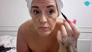 Topless Mature Slut Prepares Makeup with Shaved Pussy on Display