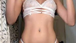 a latina girl rips her clothes off in a steamy striptease solo