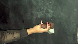 Wife sneaks to glory hole for stranger action