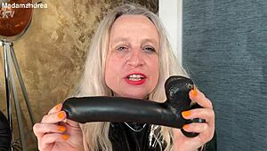 Horny prolapse fisting in latex corset with mega dildo outdoors