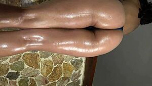 the beautiful oiled butt and legs of xattlalust in red and dark blue panties excite me.