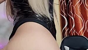 latex transsexual indulges in solo play, exploring desires through intense self-pleasure.