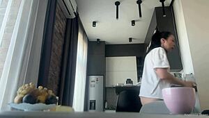 Hey, why’s this fit brunette cleaning with no panties on?