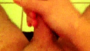 He indulges in solo wanking in the toilet