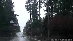 a redhead teen relaxes in the car outdoors