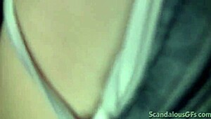 a redhead teen relaxes in the car outdoors