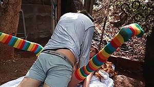 A latina friend uses a sex toy on her pussy outdoors in public.